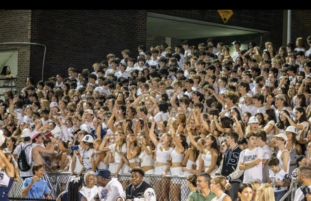 Staples students show their school spirit at a white-out football game on Sep. 9 2022.

